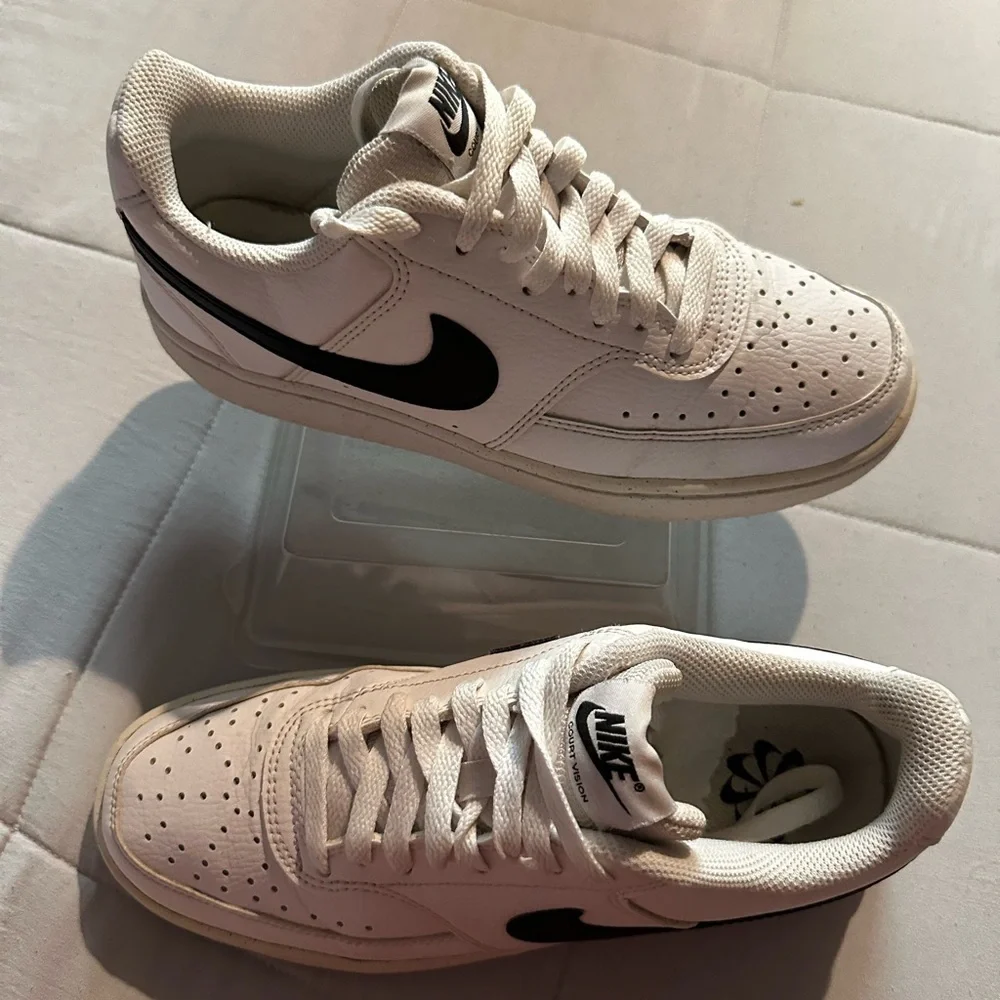 Nike Cream and Black Low-Top Sneakers